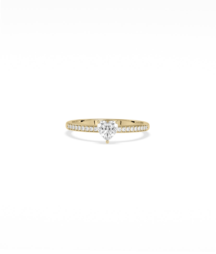Diamond pavé heart solitaire ring in yellow gold
