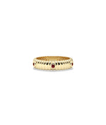 Station fluted band ring in 14K yellow gold with garnet gemstone