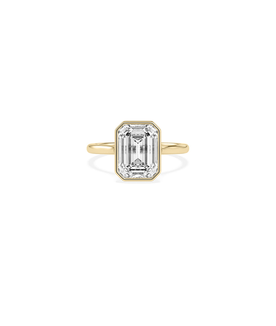 Bezel set emerald lab diamond solitaire ring in yellow gold
