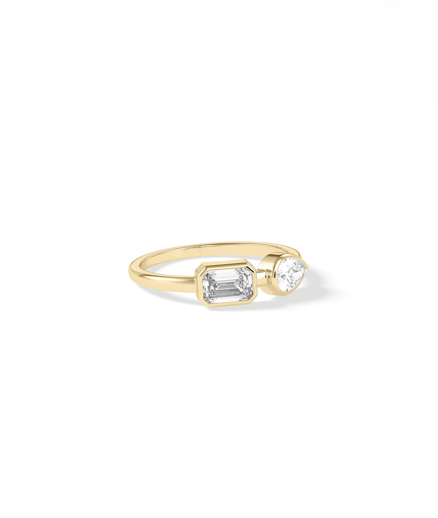 Bezel set emerald pear lab diamond ring in 14K yellow gold side view