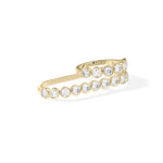 Bezel round lab diamond two-finger ring in 14K yellow gold side profile