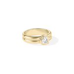 Side profile of a bezel set heart lab diamond solitaire ring in 14K yellow gold