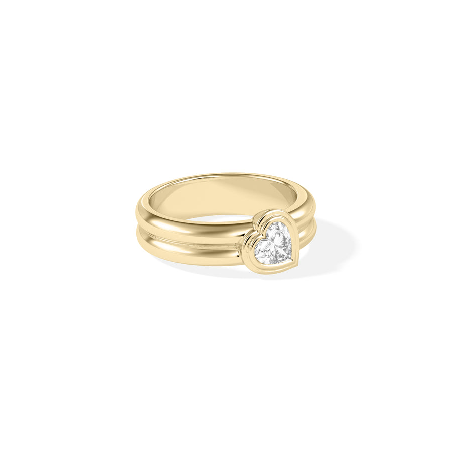 Side profile of a bezel set heart lab diamond solitaire ring in 14K yellow gold