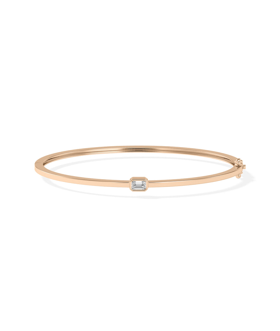 Bezel-set solitaire diamond bangle in 14K rose gold