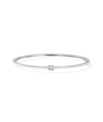 Bezel-set solitaire diamond bangle in 14K solid white gold