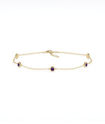 14K yellow gold bezel set amethyst station bracelet