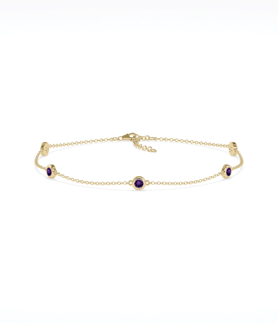 14K yellow gold bezel set amethyst station bracelet