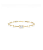 14K yellow gold chain bracelet with bezel-set solitaire lab diamond centerpiece