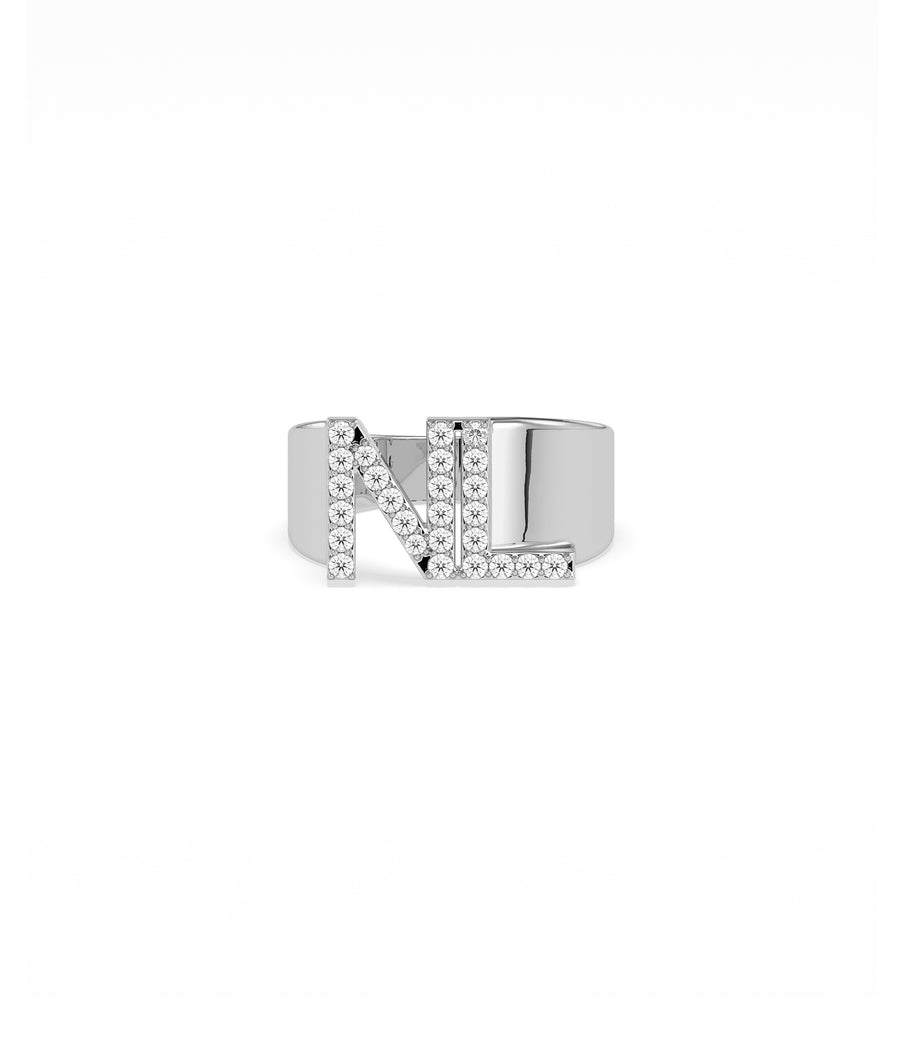 Custom 14K gold band ring with bold diamond-set initials