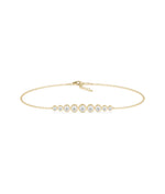 Diamond graduating bezel bracelet in 14K solid yellow gold