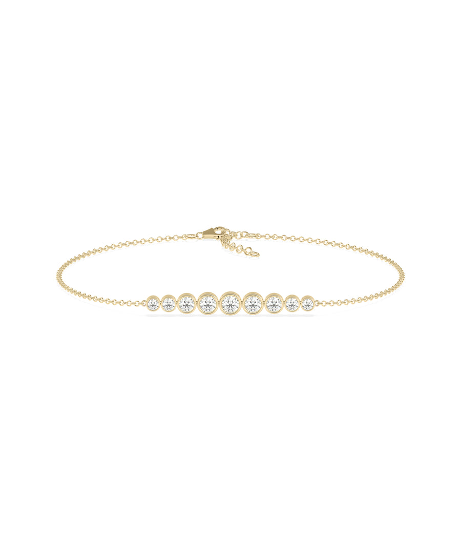 Diamond graduating bezel bracelet in 14K solid yellow gold