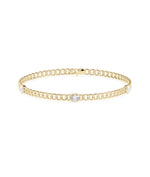 Diamond solitaire curb link bracelet in 14K yellow gold