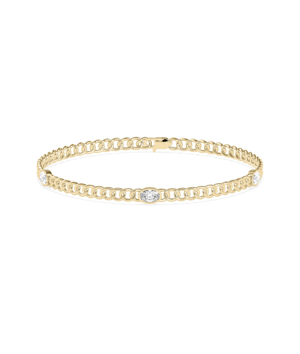 Diamond solitaire curb link bracelet in 14K yellow gold
