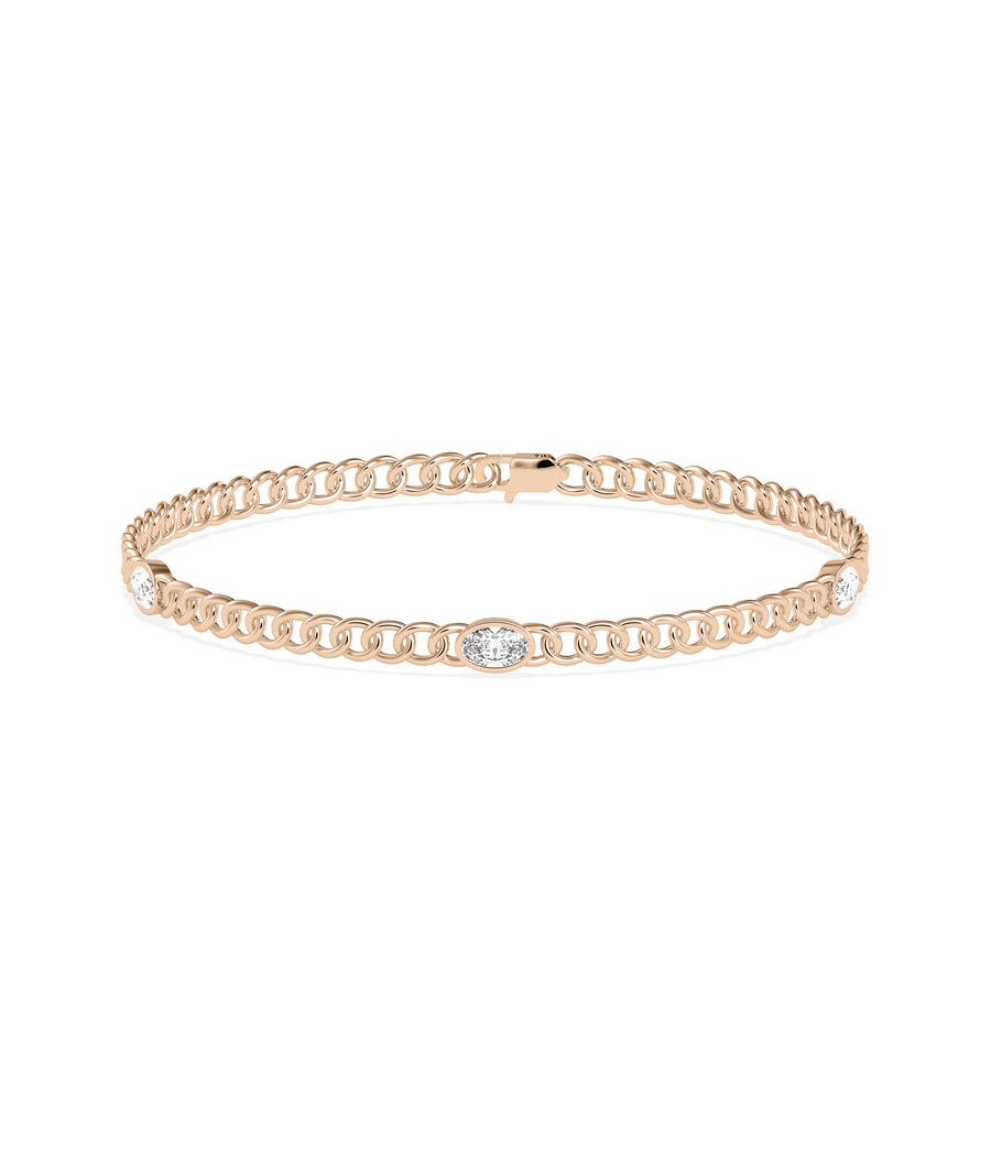 Diamond solitaire curb link bracelet in 14K rose gold