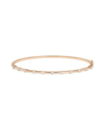 Diamond station bangle in 14K rose gold with station-set diamonds