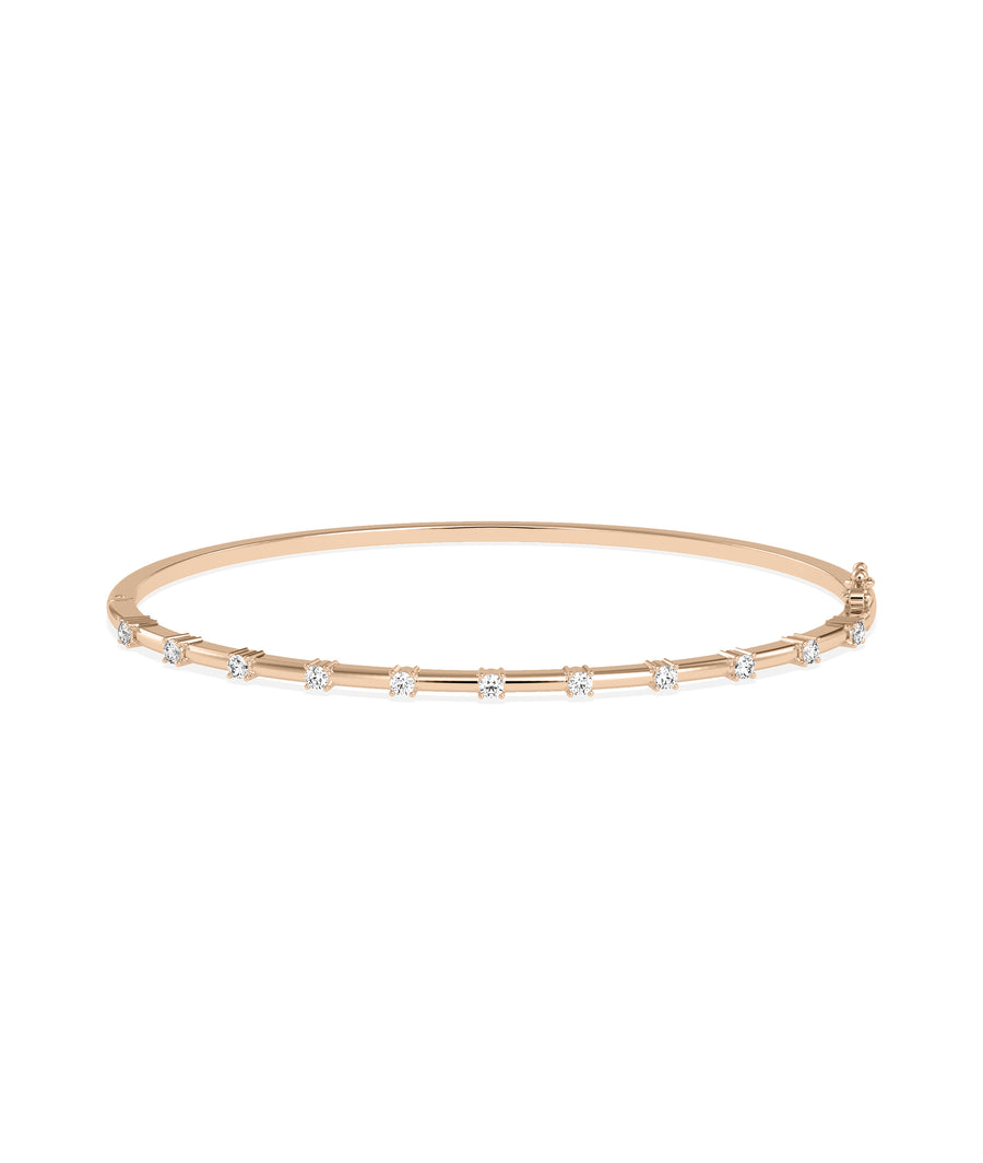 Diamond station bangle in 14K rose gold with station-set diamonds