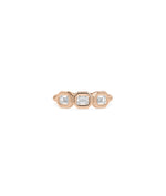Emerald cut bezel diamond band ring in rose gold