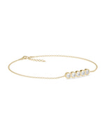 Five-stone bezel diamond bracelet in 14K yellow gold side profile view