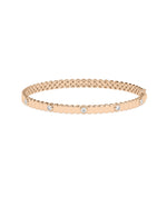 Fluted diamond bangle with bezel stations in 14K rose gold