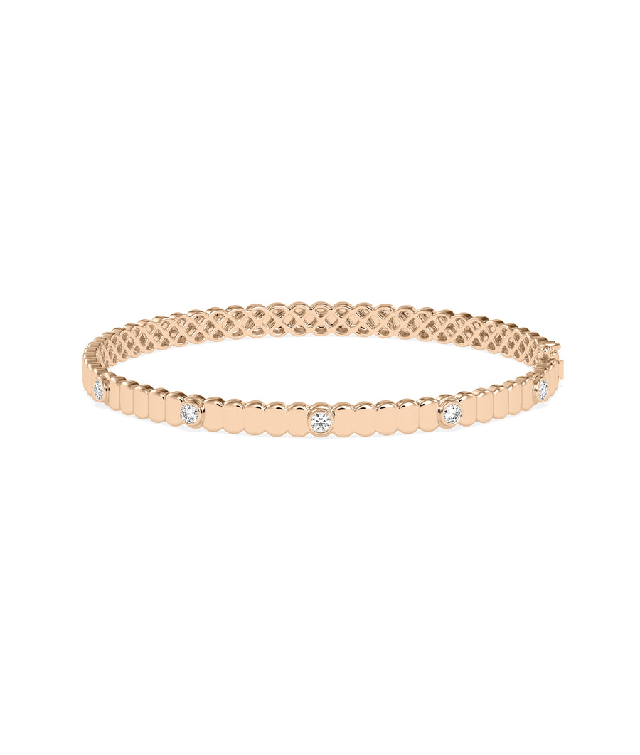 Fluted diamond bangle with bezel stations in 14K rose gold
