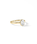 Four prong solitaire lab diamond ring in 14K yellow gold side profile