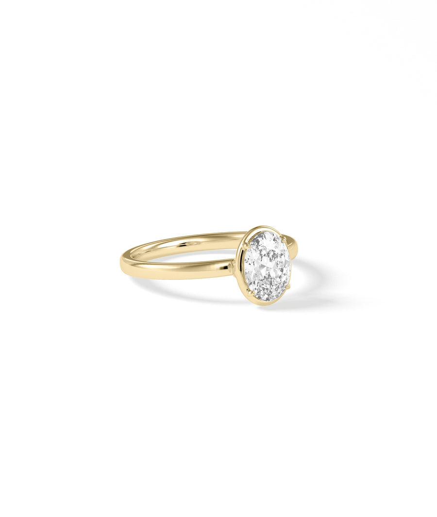 Four prong solitaire lab diamond ring in 14K yellow gold side profile