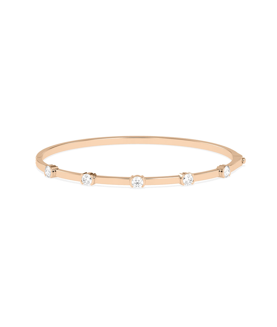 Half bezel round lab diamond bangle in 14K rose gold