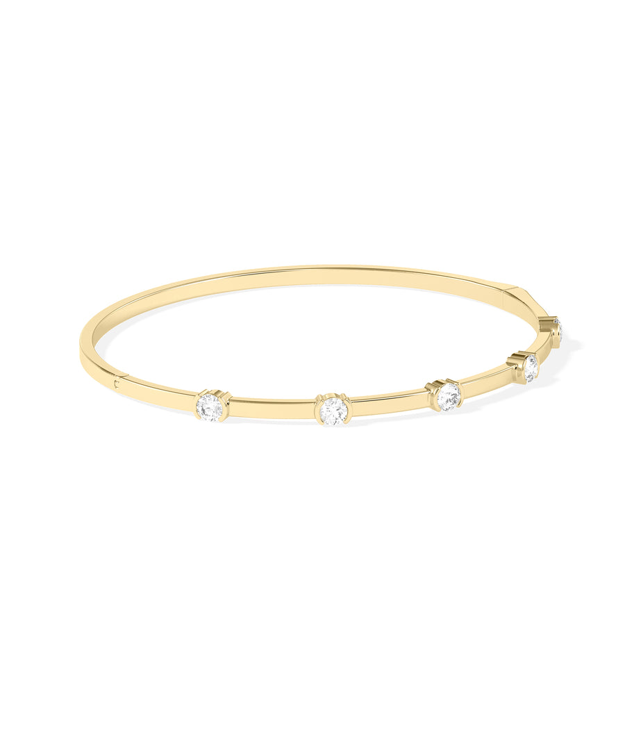 Half bezel round lab diamond bangle in yellow gold side profile view