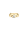Heart-shaped diamond bezel set ring in polished yellow gold with double band design