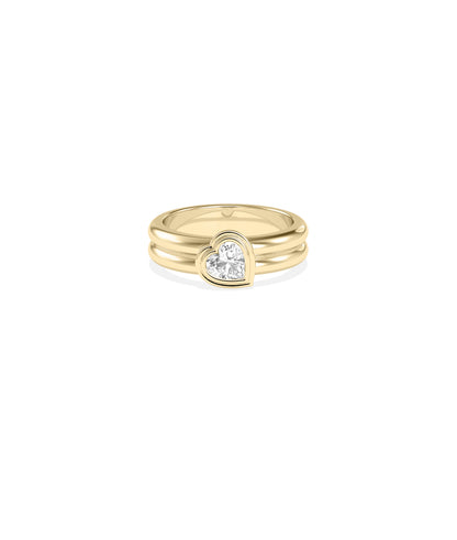 Heart-shaped diamond bezel set ring in polished yellow gold with double band design