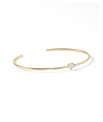 Side view of 14K solid yellow gold heart solitaire accent cuff bangle