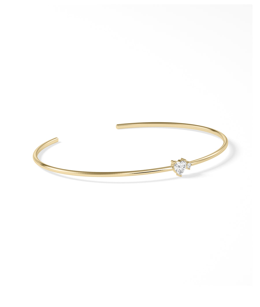 Side view of 14K solid yellow gold heart solitaire accent cuff bangle