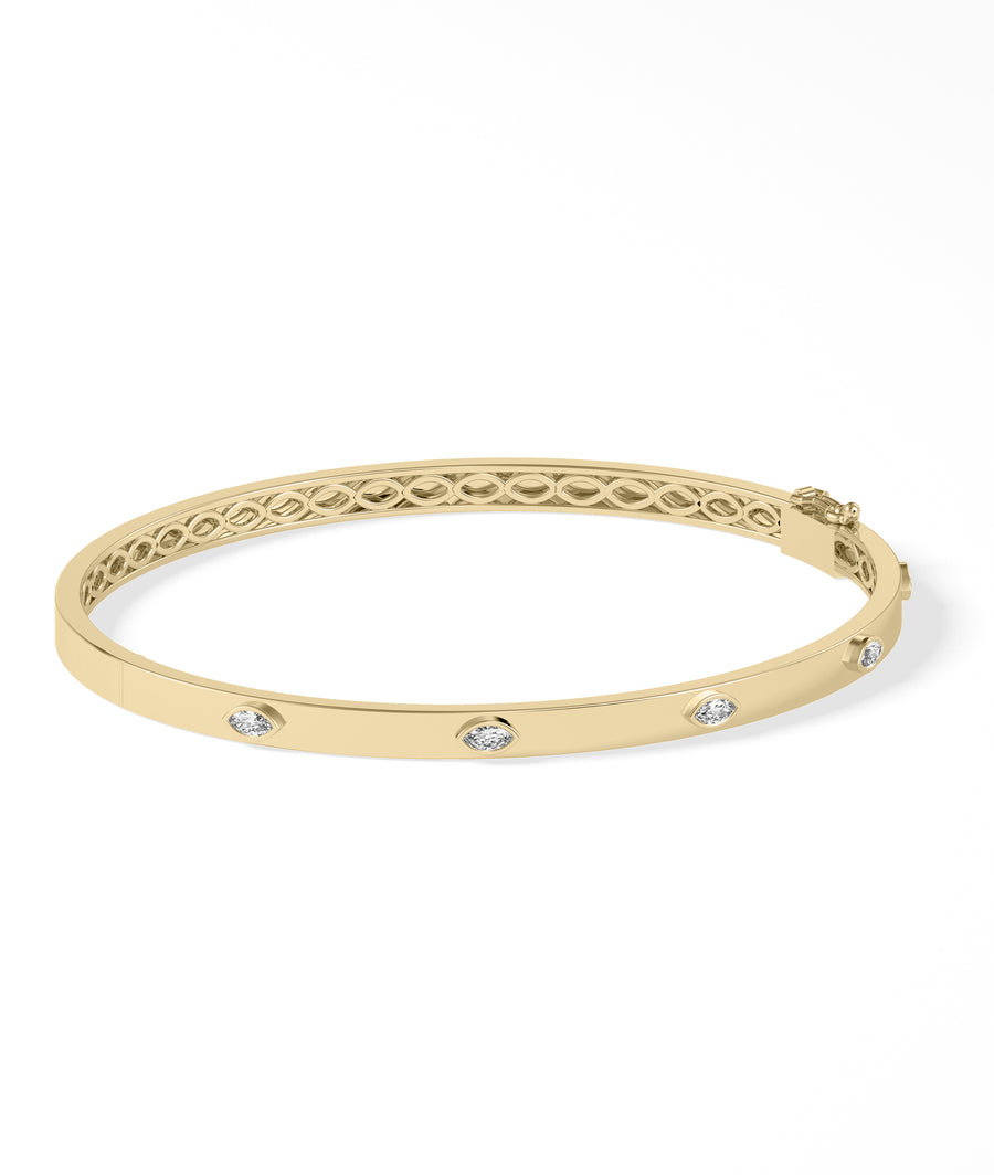 Marquise diamond station bangle in 14K yellow gold side view
