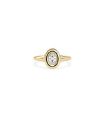 Oval bubble set solitaire diamond pinky ring in 14K yellow gold