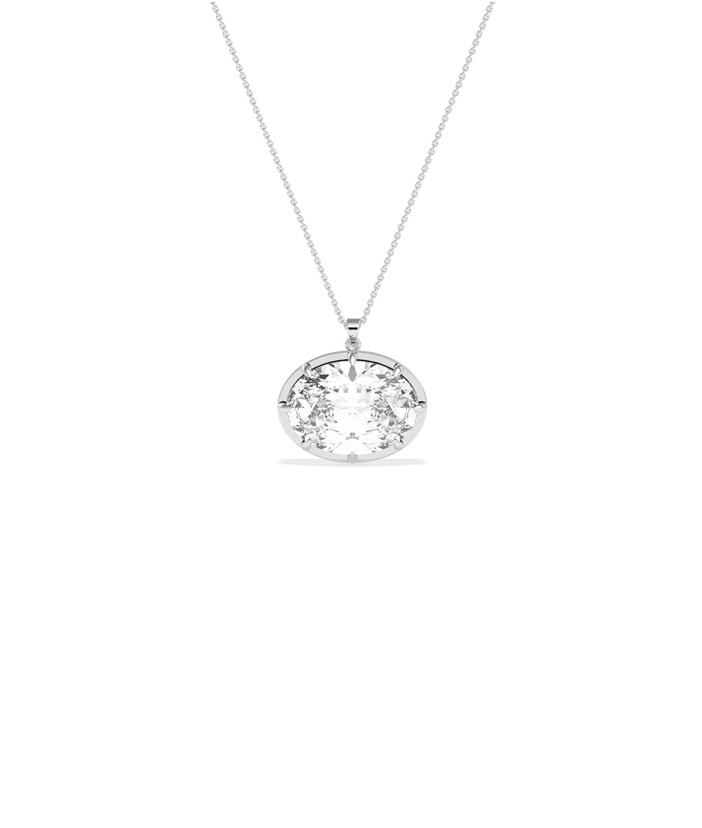 Large oval faceted crystal pendant on a delicate white gold cable chain necklace