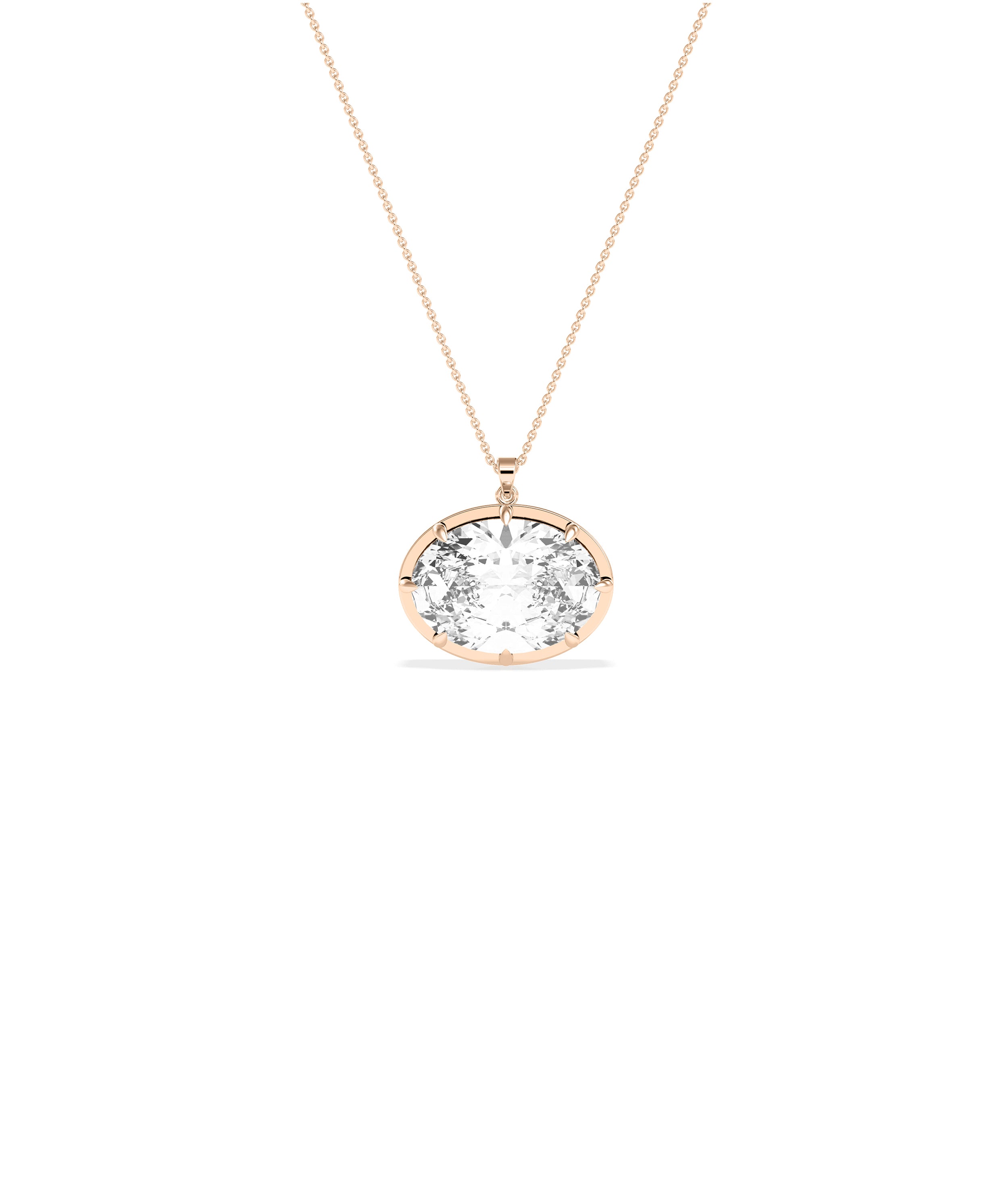 Large oval diamond pendant on a delicate rose gold chain with prong setting
