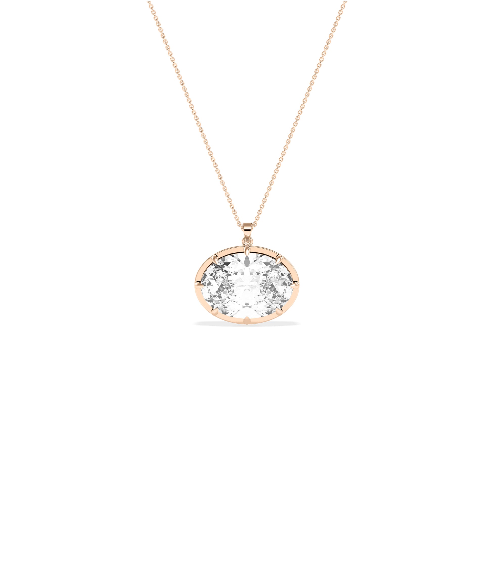 Large oval diamond pendant on a delicate rose gold chain with prong setting
