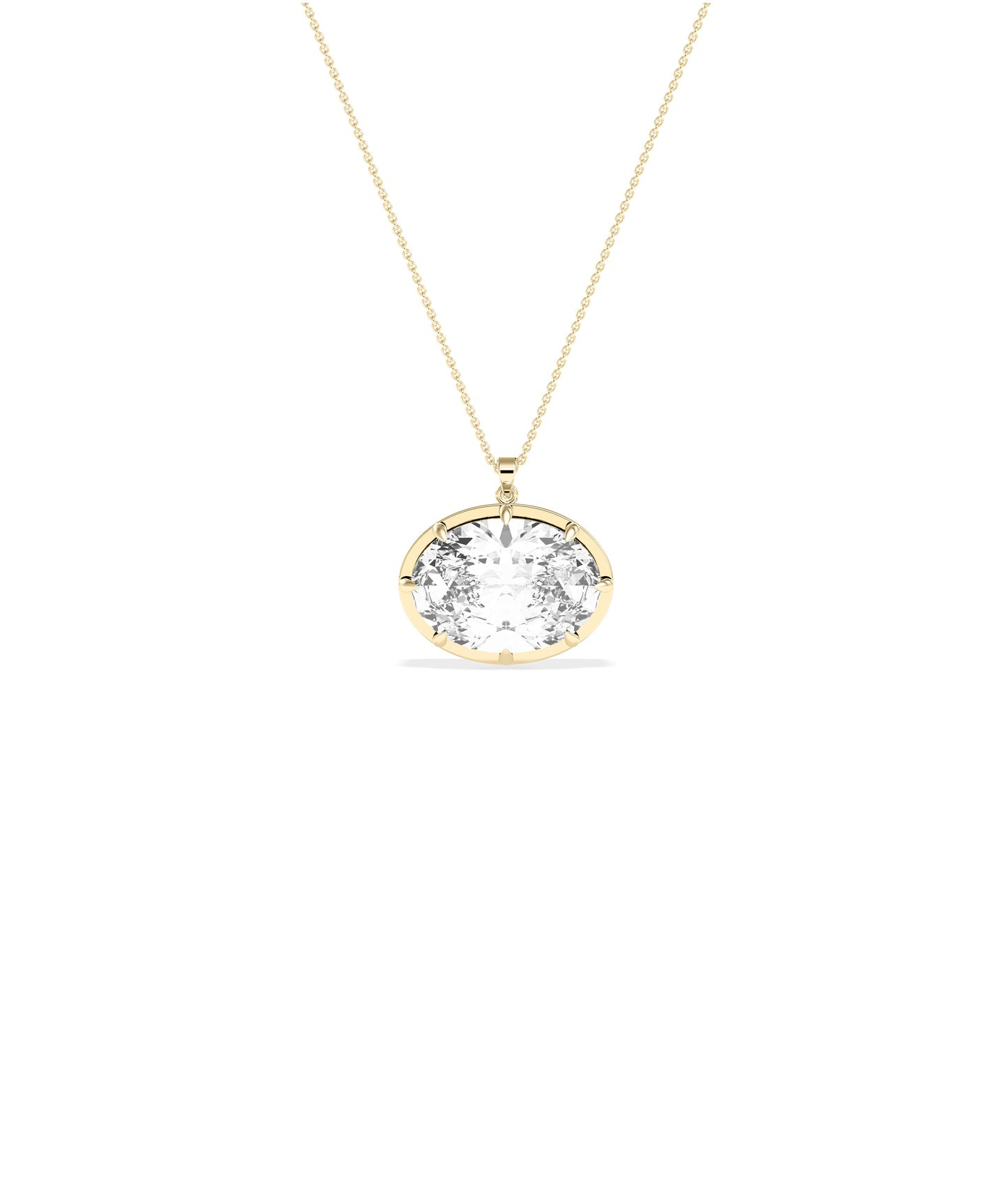 Large oval diamond pendant set in yellow gold prong bezel on delicate yellow gold chain