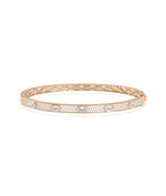 Pavé diamond station bangle bracelet in 14K rose gold