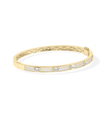 Pavé diamond station bangle bracelet in 14K yellow gold side profile