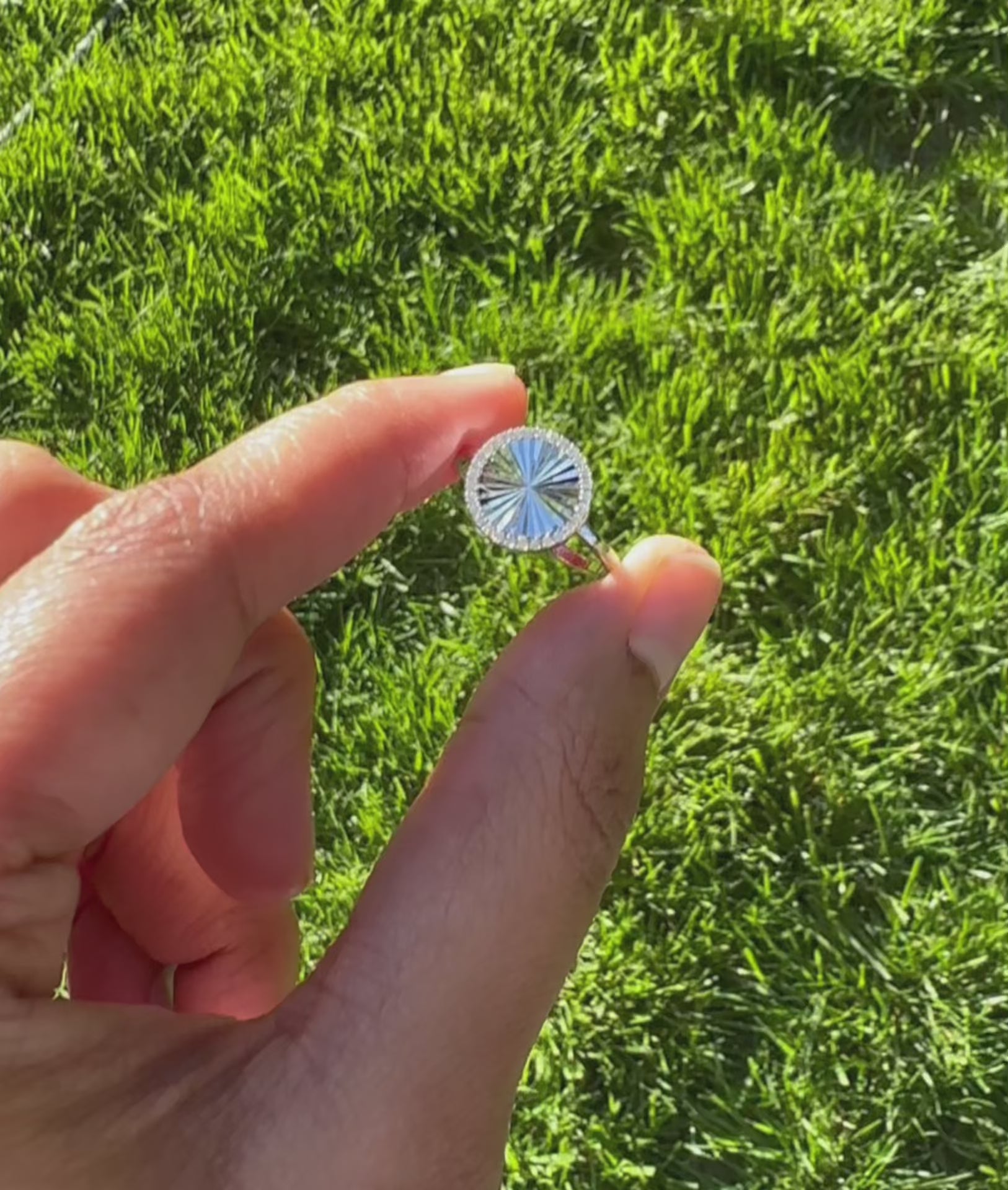 Fluted Circle Ring styled on jewelry display with elegant presentation