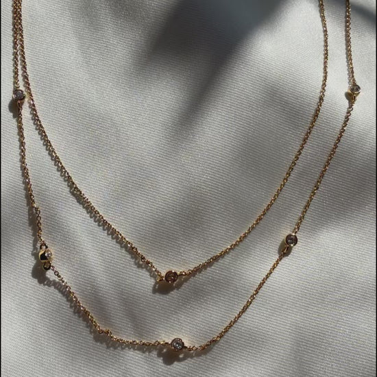 Two-chain layered bezel stations diamonds dimensional presentation