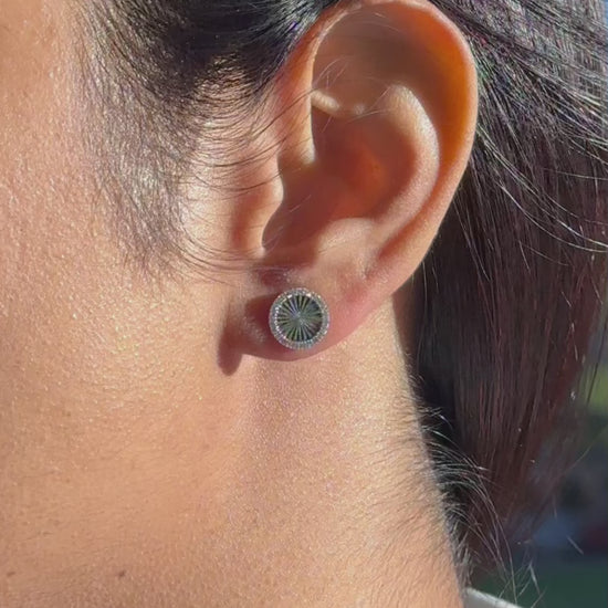 Fluted Circle Stud Earrings worn on ear displaying modern elegance