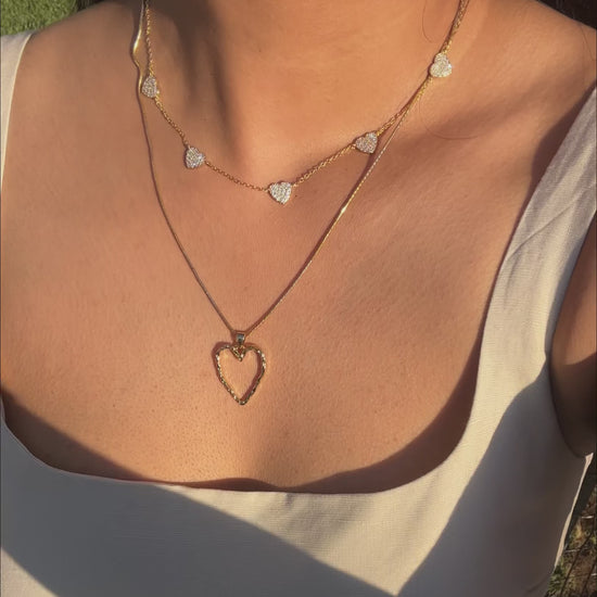 Heart Pave Station Necklace worn on model displaying comprehensive sparkle
