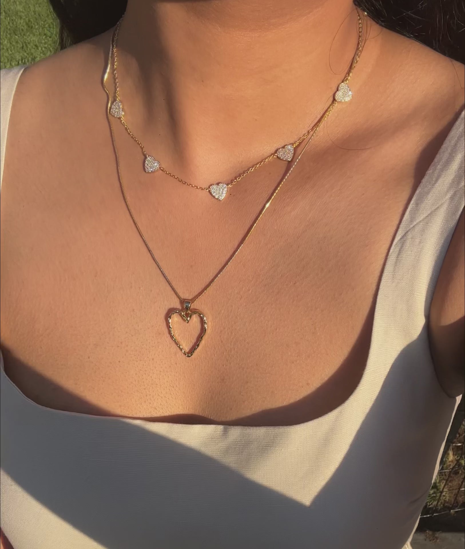 Heart Pave Station Necklace worn on model displaying comprehensive sparkle
