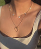 Heart Pave Station Necklace worn on model displaying comprehensive sparkle

