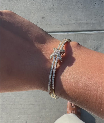 Intersecting diamond rows flexible cuff fashion presentation