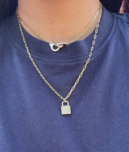 Paper Clip Necklace with Handcuff Charm on display showcasing industrial-chic