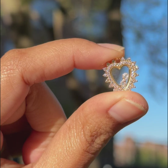 Heart shaped memory locket 15mm flat lay showing delicate size and heart silhouette