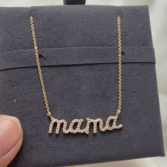 Detail shot of complete pavé diamonds on inspirational mantra word